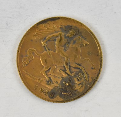 Lot 878 - A George V 1913 half sovereign.