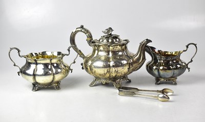 Lot 693 - A William IV hallmarked silver three-piece tea...