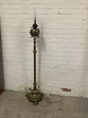 Lot 1609 - A Victorian brass adjustable standard oil lamp...