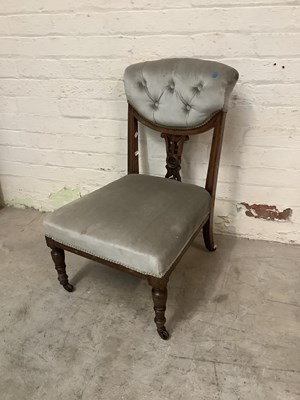 Lot 2535 - A Victorian nursing chair with button back.