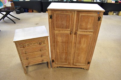 Lot 2584 - A 1920s limed oak two piece bedroom suite...