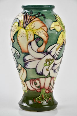 Lot 94 - MOORCROFT; a large vase of shouldered form...