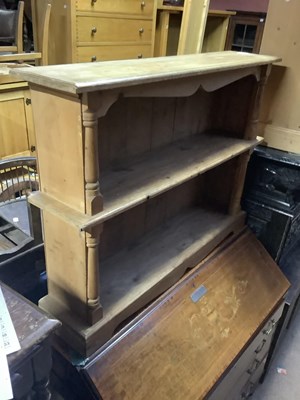 Lot 2398 - A small pine book case with one fixed shelf,...