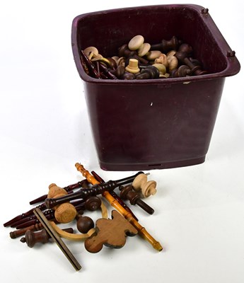 Lot 1473 - A large collection of wooden knobs and spindles.