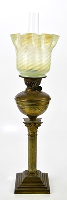 Lot 1607 - A 19th century brass oil lamp with shade and...