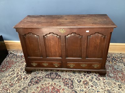 Lot 2457 - An 18th century oak mule chest with hinge top...
