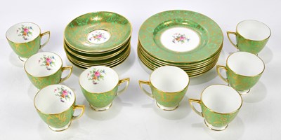 Lot 2127 - MINTON; a tea set, to include eight cups,...