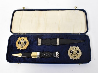 Lot 482 - A presentation cased set containing two...
