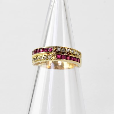 Lot 849 - A 14ct gold ring in the form of a band set...