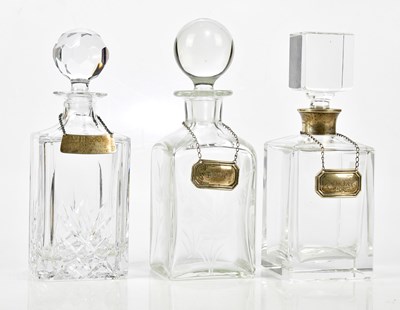Lot 2552 - Three clear glass decanters, one with silver...
