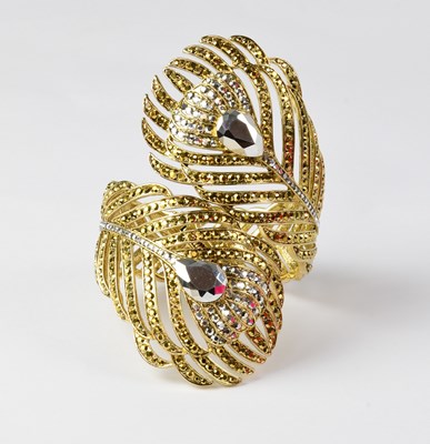 Lot 1006 - BUTLER & WILSON; a gold-coloured metal cuff in...
