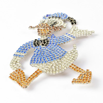 Lot 1007 - BUTLER & WILSON; a gem set brooch in the form...