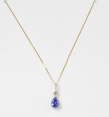 Lot 936 - A 14ct white gold pendant set with...