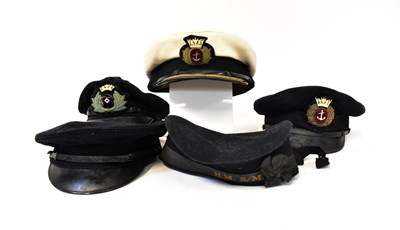 Lot 494 - Four various peaked naval caps and a...