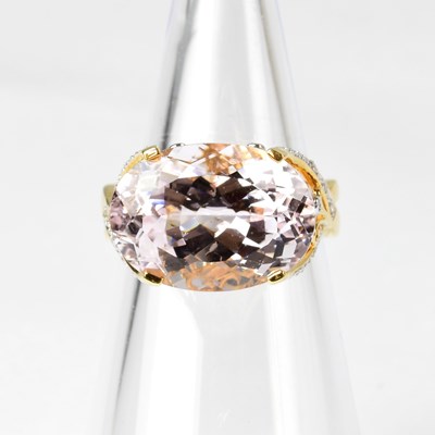 Lot 831 - An 18ct gold ring set with kunzite in a claw...