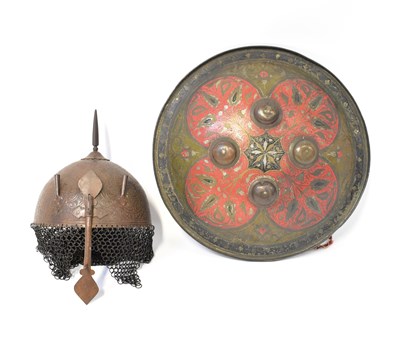 Lot 498 - An Indo-Persian Kulah Khud helmet with incised...