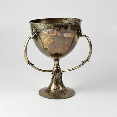 Lot 685 - A George V hallmarked silver triple-handled...