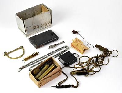 Lot 444 - A WWII period German cased rifle cleaning kit,...
