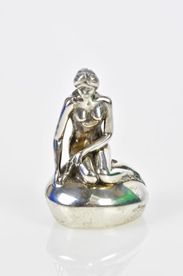 Lot 2548 - A sterling silver paperweight modelled as a...