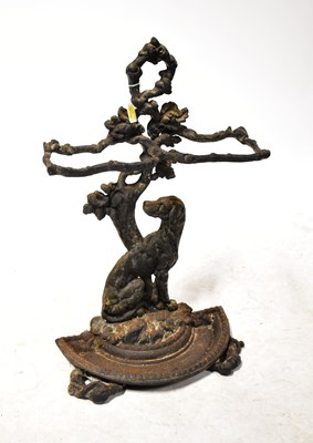 Lot 197 - A 19th century Coalbrookdale-style cast iron double stick stand