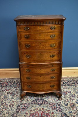 Lot 2627 - A 1950s mahogany serpentine fronted chest on...
