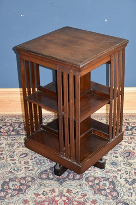 Lot 6643 - An Edwardian revolving bookcase, width 47cm,...