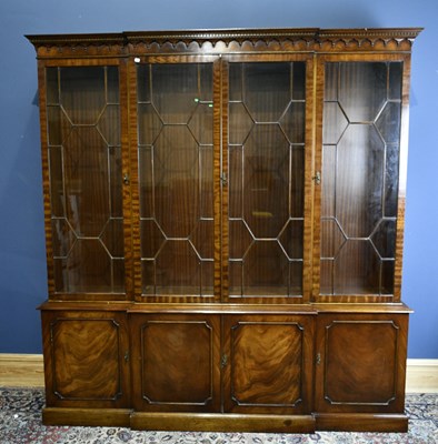 Lot 6570 - A large reproduction mahogany breakfront...