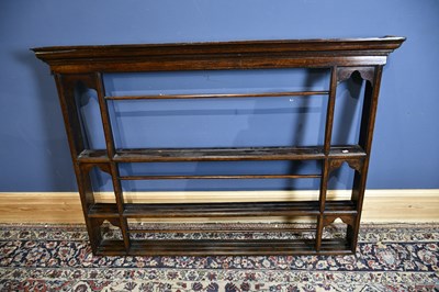 Lot 6537 - An 18th century oak wall mounted open plate...