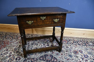 Lot 6526 - An 18th century oak single drawer side table...