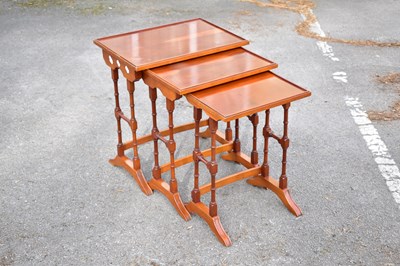 Lot 2677 - A reproduction nest of graduated coffee tables...