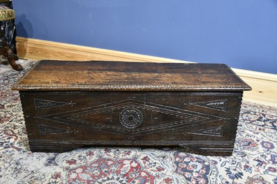 Lot 6518 - An 18th century oak six plank coffer with...