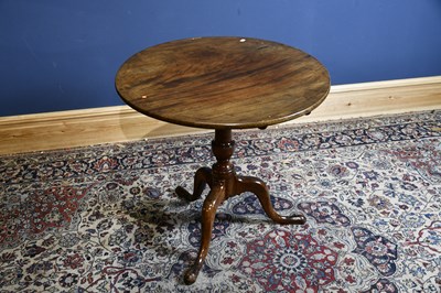 Lot 6642 - A George III mahogany circular tilt-top table...