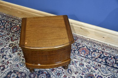 Lot 6694 - A Victorian mahogany commode on turned supports.