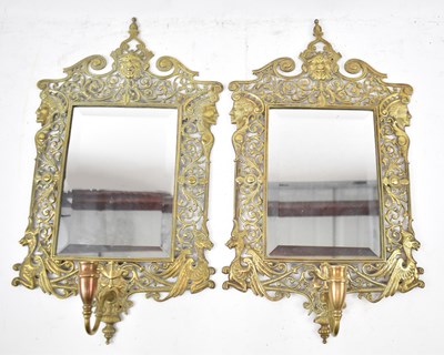 Lot 518 - A pair of decorative pierced brass bevelled...