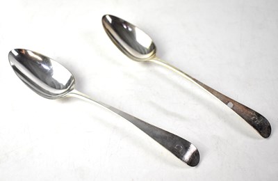Lot 715 - A pair of George III hallmarked silver basting spoons