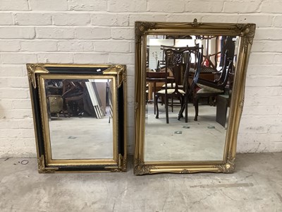 Lot 2655 - A modern black and gilt framed wall mirror, 80...