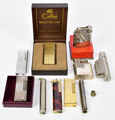 Lot 1408 - DUNHILL; a silver plated cigarette lighter,...