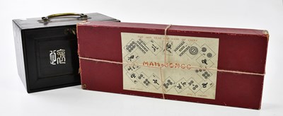 Lot 5035 - A mahjong set with bone and bamboo counters,...