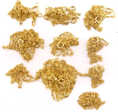 Lot 966 - Twelve 9ct gold dainty necklaces of various sizes
