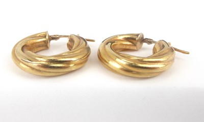 Lot 931 - A pair of 9ct gold twist hoop earrings