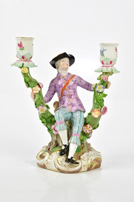 Lot 2171 - MEISSEN; a 19th century twin branch figural...