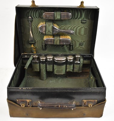 Lot 725 - GEORGE HENRY JAMES & CO; a George V leather...