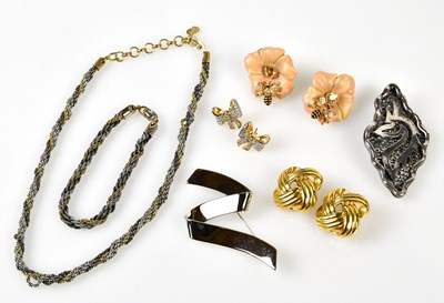 Lot 861 - CHRISTIAN DIOR; a gold and silver four tone...