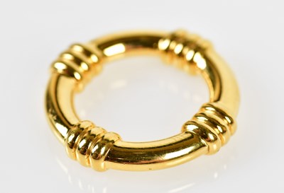 Lot 959 - HERMÈS; a gold tone scarf ring, stamped Hermès,...