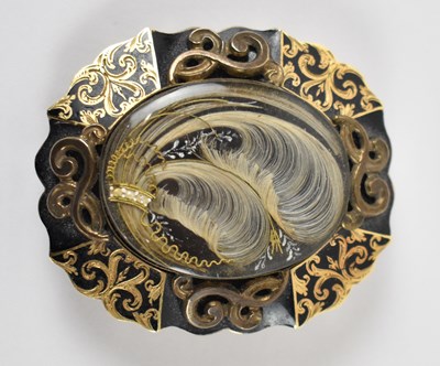 Lot 804 - A mid 19th century yellow metal mourning...
