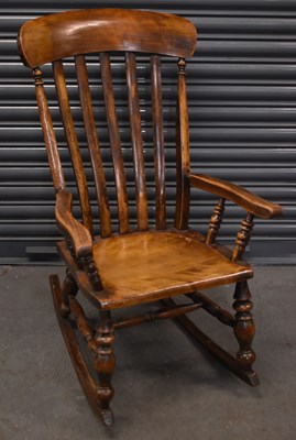 Lot 76 - A circa 1900 elm and stained beech bar back...
