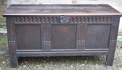 Lot 41 - An 18th century oak plank top coffer, with...