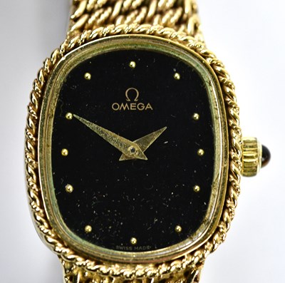 Lot 2899 - OMEGA; a lady's vintage 9ct yellow gold...