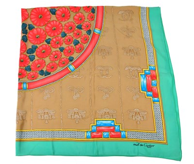 Lot 932 - CARTIER; a large 100% silk beige, red, yellow...