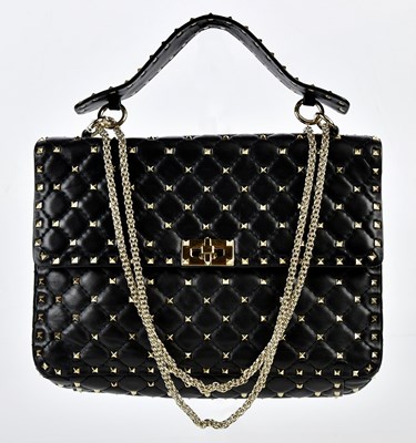 Lot 873 - VALENTINO; an unused black lambskin leather...